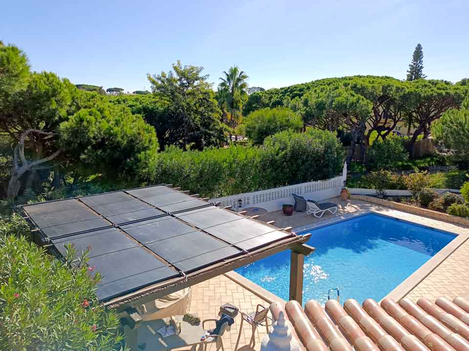 Solar panels installed on a rooftop for pool heating